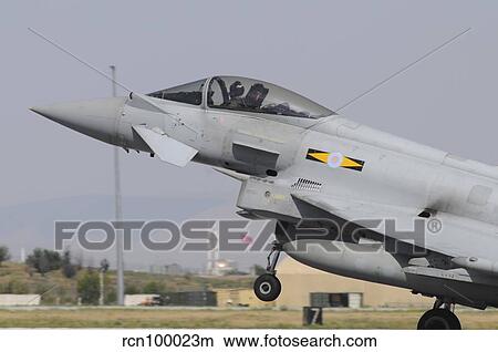 A Royal Air Force Eurofighter EF2000 Typhoon taking off. View Large Photo Image Picture - A Royal Air Force Eurofighter EF2000 Typhoon taking off.. Fotosearch