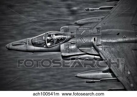 A Royal Air Force Harrier GR9 flying low over North Wales. View Large Photo Image Picture - A Royal Air Force Harrier GR9 flying low over North Wales.. Fotosearch