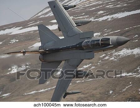 A Royal Air Force Tornado GR4 during low fly training in North Wales. View Large Photo Image Picture - A Royal Air Force Tornado GR4 during low fly training in North Wales.. Fotosearch