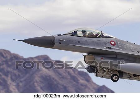 A Royal Danish Air Force F-16AM Fighting Falcon taking off. View Large Photo Image Picture - A Royal Danish Air Force F-16AM Fighting Falcon taking off.. Fotosearch