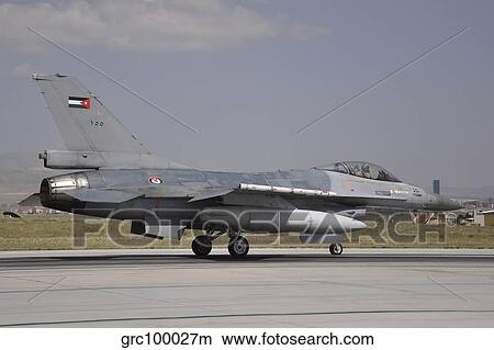 A Royal Jordanian Air Force F-16AM aircraft ready for take-off. View Large Photo Image Picture - A Royal Jordanian Air Force F-16AM aircraft ready for take-off.. Fotosearch