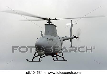 A RQ-8A Fire Scout unmanned aerial vehicle in flight. View Large Photo Image Picture - A RQ-8A Fire Scout unmanned aerial vehicle in flight.. Fotosearch