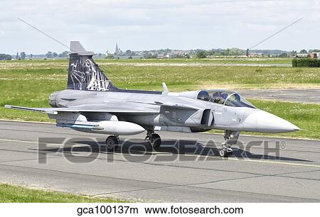 A Saab JAS-39 Gripen of the Czech Air Force on the flight line at Cambrai Air Base, France. View Large Photo Image Picture - A Saab JAS-39 Gripen of the Czech Air Force on the flight line at Cambrai Air Base, France.. Fotosearch