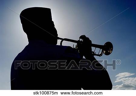 A Sailor playing Taps. View Large Photo Image Picture - A Sailor playing Taps.. Fotosearch