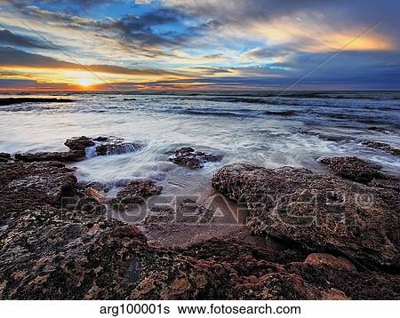 A seascape at sunrise from Miramar, Argentina. View Large Photo Image Stock Photograph - A seascape at sunrise from Miramar, Argentina.. Fotosearch