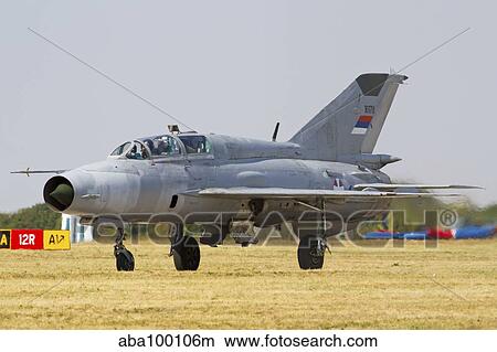 A Serbian Air Force MiG-21UM taxiing at Batajnica Air Base. View Large Photo Image Picture - A Serbian Air Force MiG-21UM taxiing at Batajnica Air Base.. Fotosearch
