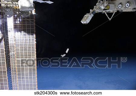 A set of NanoRacks CubeSats after deployment by the NanoRacks Launcher. View Large Photo Image Stock Photograph - A set of NanoRacks CubeSats after deployment by the NanoRacks Launcher.. Fotosearch