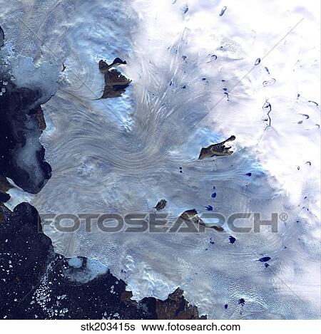 Stock Photograph - A small field of glaciers surrounds Baffin Bay along Greenland's western coast.. Fotosearch
