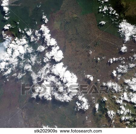 A small plume rises from Nyiragongo Volcano in the Democratic Republic of the Congo View Large Photo Image Stock Photograph - A small plume rises from Nyiragongo Volcano in the Democratic Republic of the Congo. Fotosearch