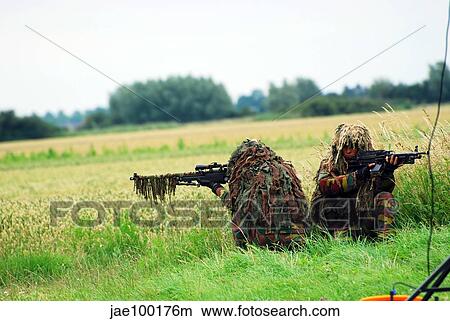 Picture - A sniper unit of the Paracommandos during an evacuation training session.. Fotosearch