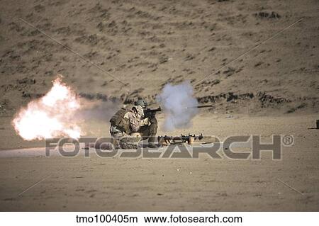 A soldier fires a rocket-propelled grenade launcher. View Large Photo Image Picture - A soldier fires a rocket-propelled grenade launcher.. Fotosearch