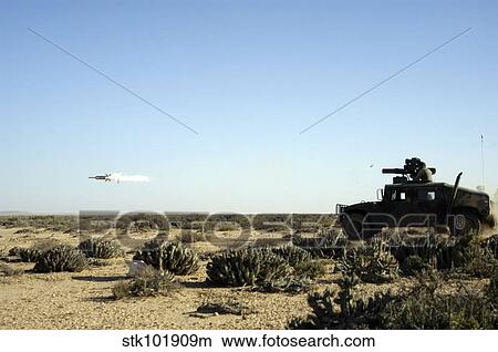 A soldier tests his skill with the tube launched, optically tracked, wire guided missile system. View Large Photo Image Picture - A soldier tests his skill with the tube launched, optically tracked, wire guided missile system.. Fotosearch