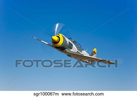 Picture - A Soviet Yakovlev Yak-11 aircraft in flight.. Fotosearch