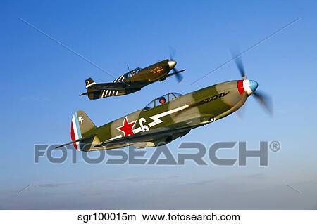 A Soviet Yakovlev Yak-3 and a P-51A Mustang in flight. View Large Photo Image Picture - A Soviet Yakovlev Yak-3 and a P-51A Mustang in flight.. Fotosearch