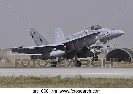 A Spanish Air Force EF-18A aircraft landing at Konya Air Base, Turkey. View Large Photo Image Picture - A Spanish Air Force EF-18A aircraft landing at Konya Air Base, Turkey.. Fotosearch