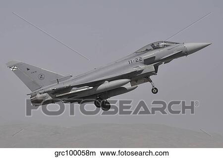 A Spanish Air Force Eurofighter Typhoon 2000 taking off. View Large Photo Image Picture - A Spanish Air Force Eurofighter Typhoon 2000 taking off.. Fotosearch