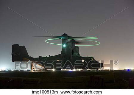 A special forces CV-22 Osprey with rotor lights on, Iraq. View Large Photo Image Picture - A special forces CV-22 Osprey with rotor lights on, Iraq.. Fotosearch