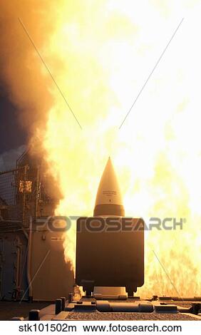 A standard missile 2 is launched from the Aegis cruiser USS Lake Erie. View Large Photo Image Picture - A standard missile 2 is launched from the Aegis cruiser USS Lake Erie.. Fotosearch
