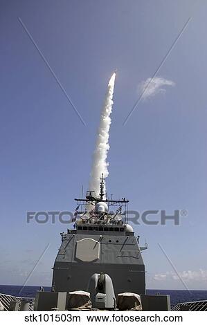 Picture - A standard missile 2 is launched from the Aegis cruiser USS Lake Erie.. Fotosearch