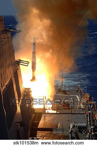 A Standard Missile 2 launches from the aft Vertical Launching System aboard USS O'Kane. View Large Photo Image Picture - A Standard Missile 2 launches from the aft Vertical Launching System aboard USS O'Kane.. Fotosearch