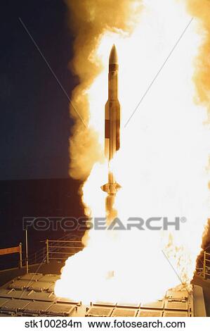 A Standard Missile Three is launched from the Mark 41 Vertical Launch System onboard USS Lake Erie. View Large Photo Image Picture - A Standard Missile Three is launched from the Mark 41 Vertical Launch System onboard USS Lake Erie.. Fotosearch