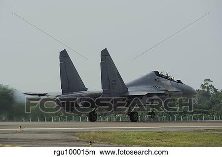 A Sukhoi Su-30MKM of the Royal Malaysian Air Force taking off. View Large Photo Image Picture - A Sukhoi Su-30MKM of the Royal Malaysian Air Force taking off.. Fotosearch