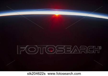 A sunset over the Aleutian Islands, with noctilucent clouds. View Large Photo Image Stock Photograph - A sunset over the Aleutian Islands, with noctilucent clouds.. Fotosearch