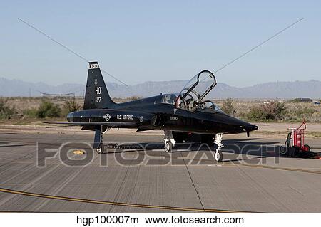 A T-38 pilot prepares to taxi his aircraft for a training mission. View Large Photo Image Picture - A T-38 pilot prepares to taxi his aircraft for a training mission.. Fotosearch