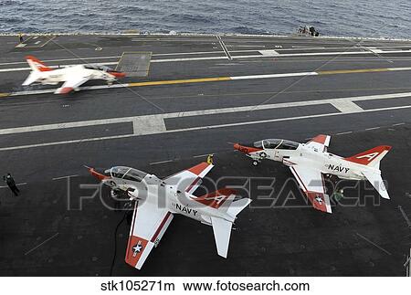 A T-45A Goshawk makes an arrested landing. View Large Photo Image Picture - A T-45A Goshawk makes an arrested landing.. Fotosearch