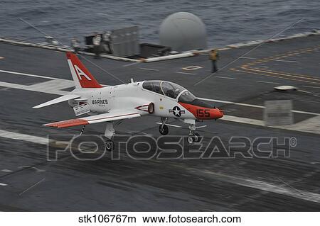 A T-45C Goshawk lands aboard USS George H. W. Bush. View Large Photo Image Picture - A T-45C Goshawk lands aboard USS George H. W. Bush.. Fotosearch