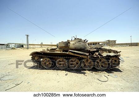 A T-55 tank destroyed by NATO forces in the desert north of Ajadabiya, Libya. View Large Photo Image Picture - A T-55 tank destroyed by NATO forces in the desert north of Ajadabiya, Libya.. Fotosearch