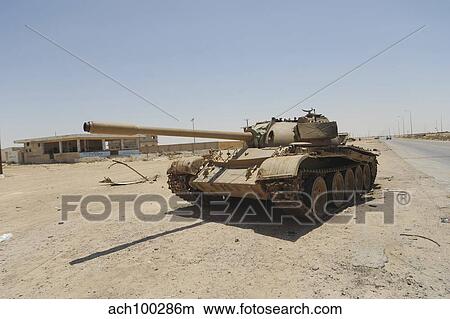 A T-55 tank destroyed by NATO forces in the desert north of Ajadabiya, Libya. View Large Photo Image Picture - A T-55 tank destroyed by NATO forces in the desert north of Ajadabiya, Libya.. Fotosearch