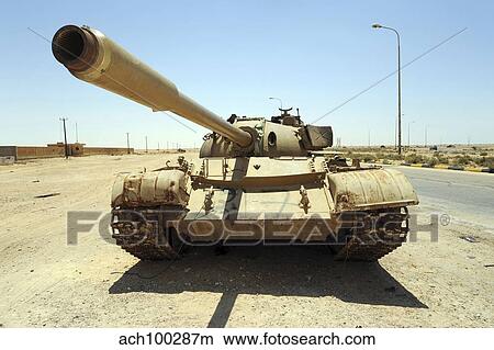 A T-55 tank destroyed by NATO forces in the desert north of Ajadabiya, Libya. View Large Photo Image Picture - A T-55 tank destroyed by NATO forces in the desert north of Ajadabiya, Libya.. Fotosearch