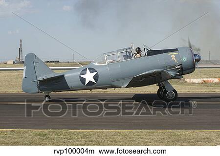 A T-6 Harvard trainer aircraft in Midland, Texas. View Large Photo Image Picture - A T-6 Harvard trainer aircraft in Midland, Texas.. Fotosearch