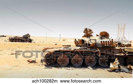 A T-80 tank destroyed by NATO forces in the desert north of Ajadabiya, Libya. View Large Photo Image Picture - A T-80 tank destroyed by NATO forces in the desert north of Ajadabiya, Libya.. Fotosearch