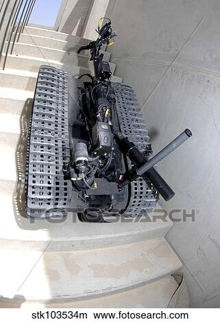 A Talon 3B robot unit climbing a flight of stairs during a training mission in Bahrain. View Large Photo Image Picture - A Talon 3B robot unit climbing a flight of stairs during a training mission in Bahrain.. Fotosearch