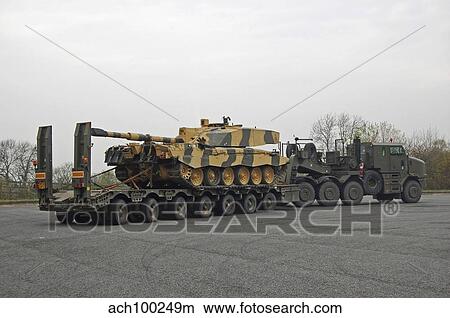 A tank transporter hauling a Challenger 2 main battle tank to Wales for an exercise. View Large Photo Image Picture - A tank transporter hauling a Challenger 2 main battle tank to Wales for an exercise.. Fotosearch