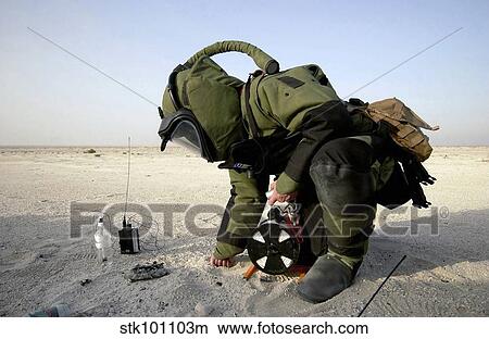 A technician dressed in a EOD-8 Explosive Ordnance Disposal Suit. View Large Photo Image Picture - A technician dressed in a EOD-8 Explosive Ordnance Disposal Suit.. Fotosearch