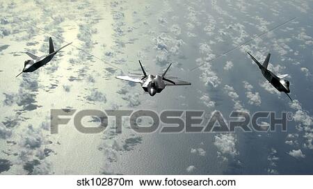 A three-ship formation of F-22 Raptors flies over the Pacific Ocean View Large Photo Image Picture - A three-ship formation of F-22 Raptors flies over the Pacific Ocean. Fotosearch