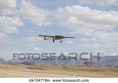 A Tiger Shark unmanned aerial vehicle prepares for landing. View Large Photo Image Picture - A Tiger Shark unmanned aerial vehicle prepares for landing.. Fotosearch