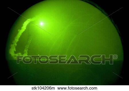 A Tomahawk cruise missile fired from USS Barry as seen through night-vision lenses. View Large Photo Image Picture - A Tomahawk cruise missile fired from USS Barry as seen through night-vision lenses.. Fotosearch