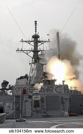 A tomahawk missile launch aboard USS Milius. View Large Photo Image Picture - A tomahawk missile launch aboard USS Milius.. Fotosearch
