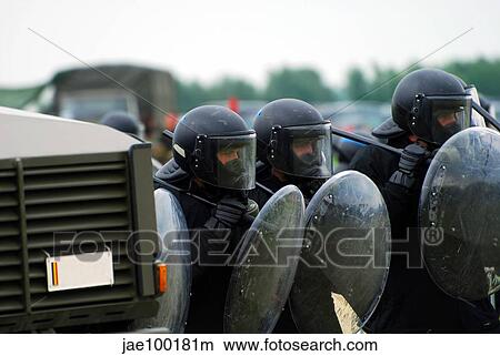 A training session in riot and crowd control by some units of the Belgian Army. View Large Photo Image Picture - A training session in riot and crowd control by some units of the Belgian Army.. Fotosearch
