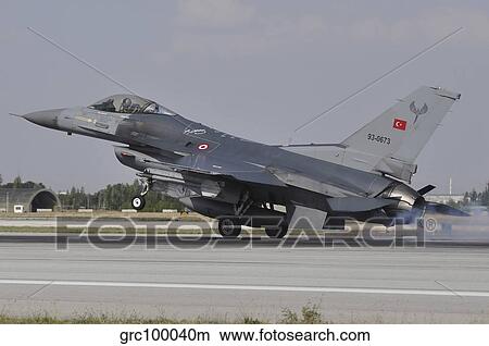 A Turkish Air Force F-16C landing on the runway at Konya Air Base, Turkey. View Large Photo Image Picture - A Turkish Air Force F-16C landing on the runway at Konya Air Base, Turkey.. Fotosearch