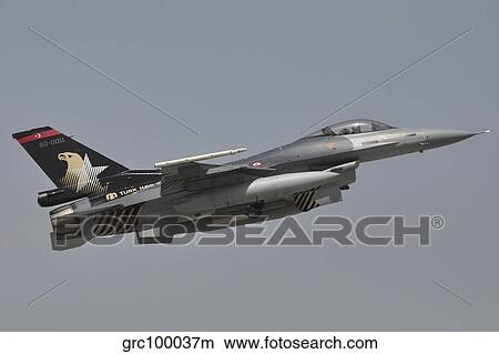 A Turkish Air Force F-16C taking off. View Large Photo Image Picture - A Turkish Air Force F-16C taking off.. Fotosearch
