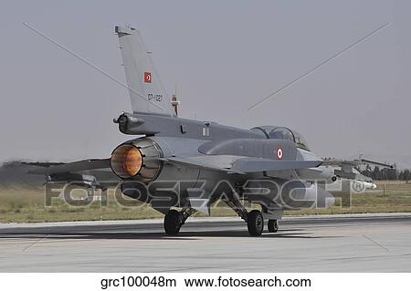 Picture - A Turkish Air Force F-16D Block 52+ taking off from Konya Air Base.. Fotosearch