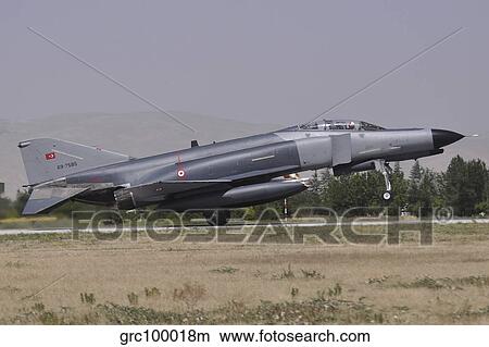 A Turkish Air Force F-4E 2020 Terminator landing at Konya Air Base, Turkey. View Large Photo Image Picture - A Turkish Air Force F-4E 2020 Terminator landing at Konya Air Base, Turkey.. Fotosearch