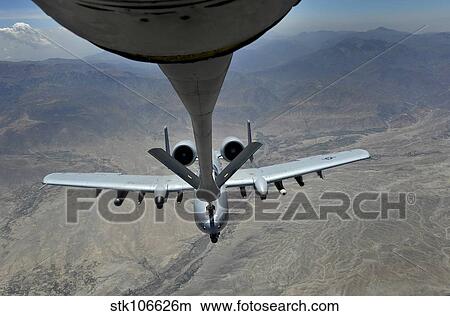 A U. S. Air Force A-10 Thunderbolt is refueled over Afghanistan. View Large Photo Image Picture - A U. S. Air Force A-10 Thunderbolt is refueled over Afghanistan.. Fotosearch
