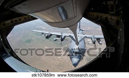Picture - A U. S. Air Force AC-130W Stinger II receiving fuel.. Fotosearch