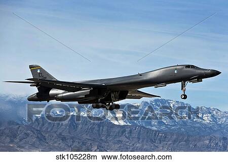 A U. S. Air Force B-1B Lancer departs for a training mission. View Large Photo Image Picture - A U. S. Air Force B-1B Lancer departs for a training mission.. Fotosearch